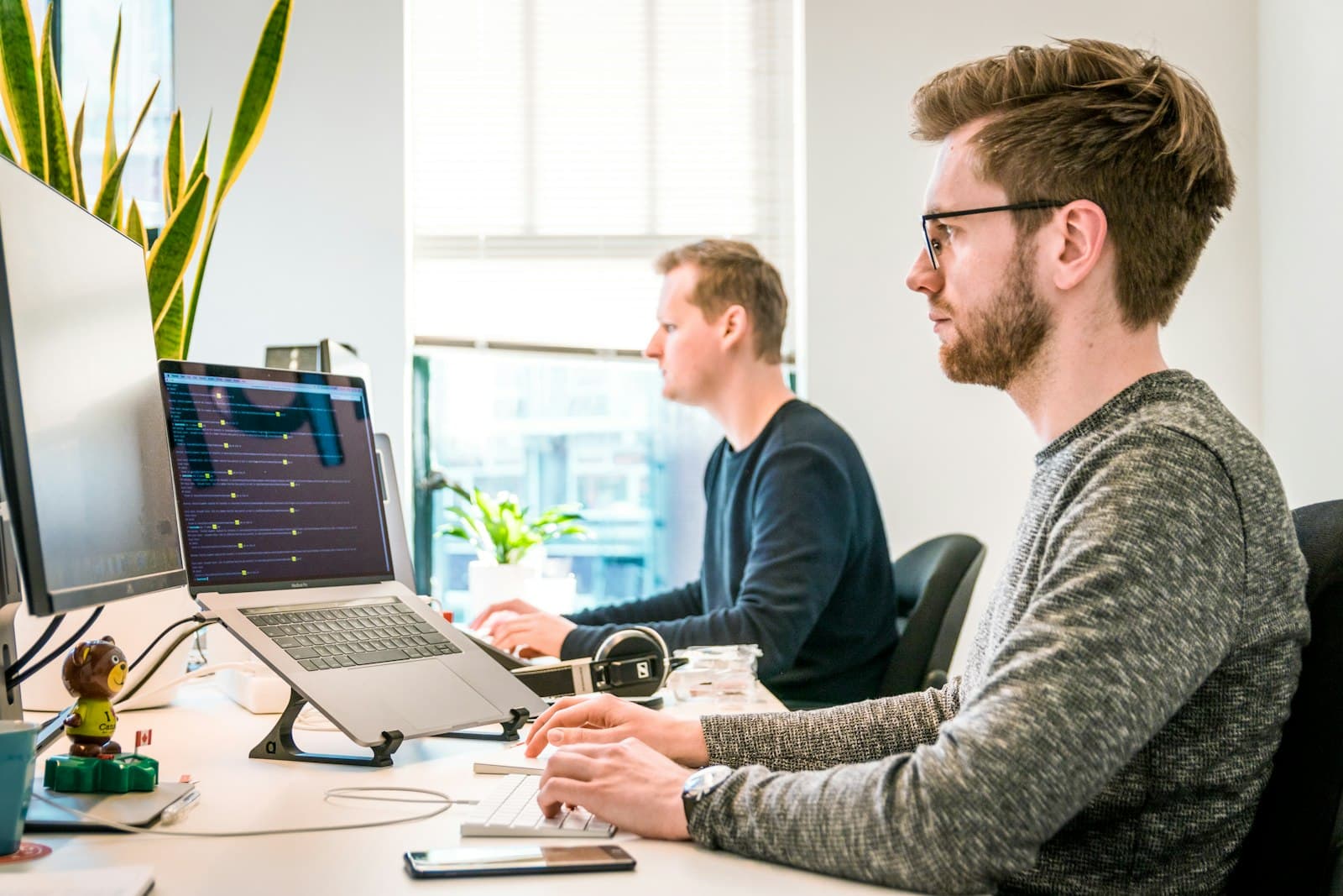 Engineers collaborating on scalable software architecture